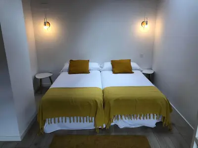 Cama o camas de una habitación en Casita Mondoto, encanto en el Pirineo