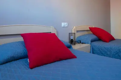 Cama o camas de una habitación en MEQUEDO AVENIDA ZARAGOZA
