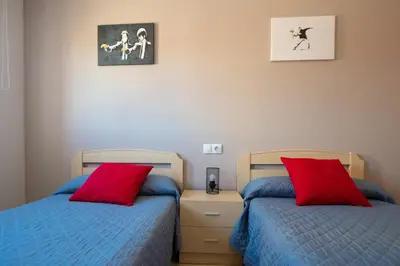 Cama o camas de una habitación en MEQUEDO AVENIDA ZARAGOZA