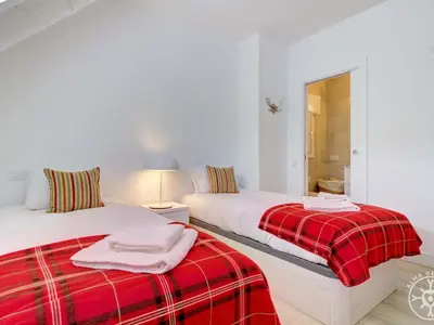 Cama o camas de una habitación en BLANHIBLAR de Alma de Nieve
