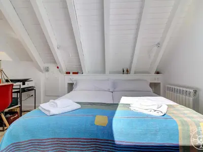 Cama o camas de una habitación en BLANHIBLAR de Alma de Nieve