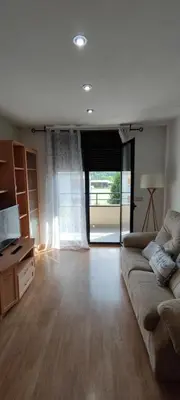 Zona de estar de Apartamento Vicente, bonito apartamento en Boltaña