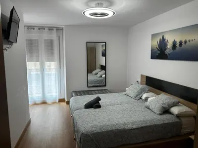Cama o camas de una habitación en Leire Jaca Centro