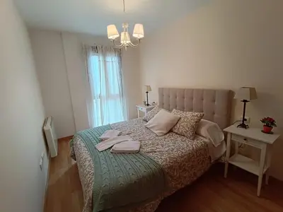 Cama o camas de una habitación en Inmocyma Los Almendros