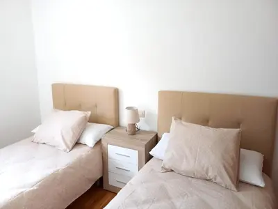 Cama o camas de una habitación en BPIRINEOS-Parque Los Tilos 3
