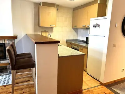 Una cocina o zona de cocina en Dúplex amb vistes fantàstiques al centre d'Esterri d'Àneu by RURAL D'ÀNEU