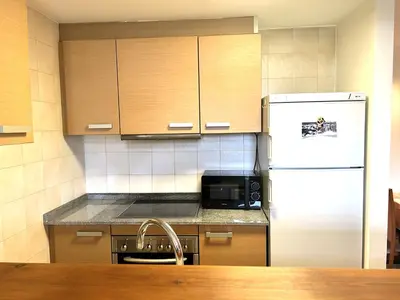 Una cocina o zona de cocina en Dúplex amb vistes fantàstiques al centre d'Esterri d'Àneu by RURAL D'ÀNEU