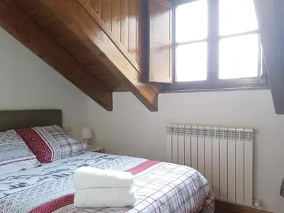 Cama o camas de una habitación en BPIRINEOS-Parque Los Tilos 4