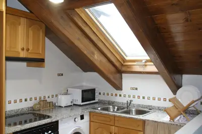 Una cocina o zona de cocina en BPIRINEOS-Parque Los Tilos 4