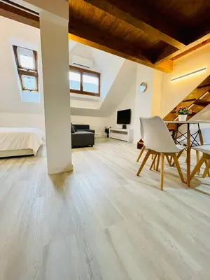 Cama o camas de una habitación en El Ático Nuevo en el centro con ascensor, garaje, aire acondicionado y WiFi