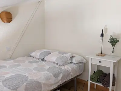 Cama o camas de una habitación en Bonito y luminoso apartamento con wifi y chimenea Aizú - Villanúa