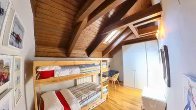 Cama o camas de una habitación en Casa Marmotte - tucasaenlospirineos