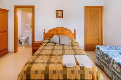 Cama o camas de una habitación en Casa Xaupí Gran