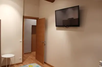 Una televisión o centro de entretenimiento en ALOJAMIENTO DUQUE DE JACA