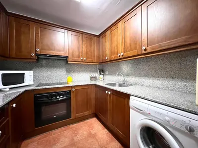 Una cocina o zona de cocina en Apartamento Raval - L'Amfitriona