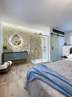 Cama o camas de una habitación en Apartamentos LA SOMERA