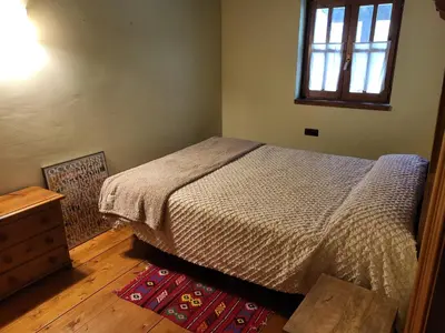 Cama o camas de una habitación en Casa de fusta al cor dels Pirineus