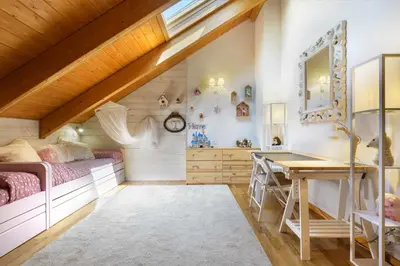 Cama o camas de una habitación en Fuente del Tesoro, dúplex vacacional en Panticosa