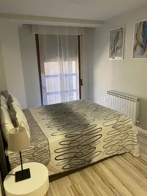 Cama o camas de una habitación en Casa Alberto 1 izda