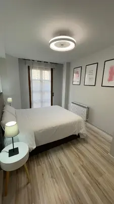 Cama o camas de una habitación en Casa Alberto 2 izda