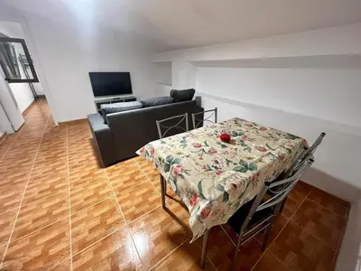 Una televisión o centro de entretenimiento en Atico CabezoDoce