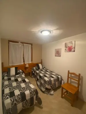 Cama o camas de una habitación en Allotjament rural Casa Milagros
