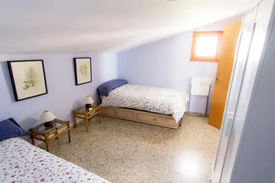 Cama o camas de una habitación en Casa Guaranatura alojamiento y barrancos