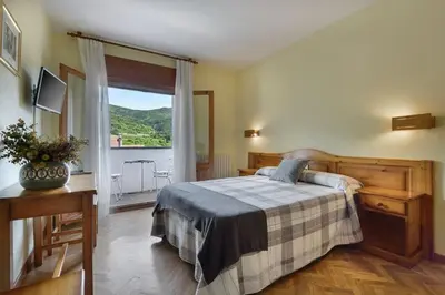 Cama o camas de una habitación en Hotel Lo Foraton