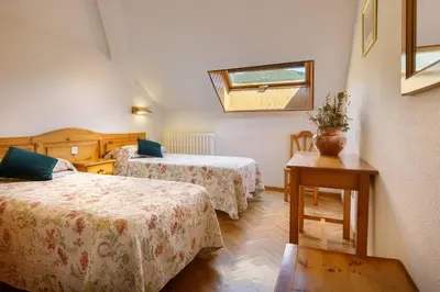 Cama o camas de una habitación en Hotel Lo Foraton