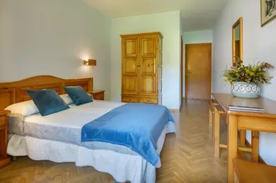 Cama o camas de una habitación en Hotel Lo Foraton