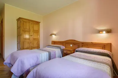 Cama o camas de una habitación en Hotel Lo Foraton