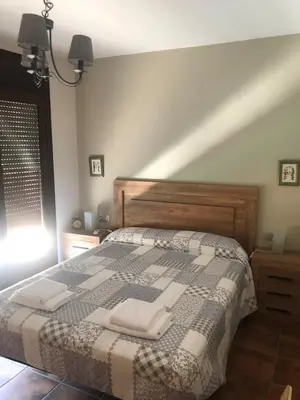 Cama o camas de una habitación en Casa Rural El Corral del Tío Santiago