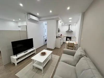 Una televisión o centro de entretenimiento en Apartamenticos Boggiero VI