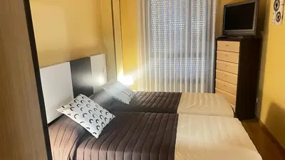 Cama o camas de una habitación en El Primero G Zaragoza - Aljafería