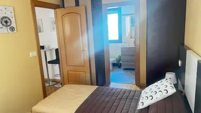 Cama o camas de una habitación en El Primero G Zaragoza - Aljafería