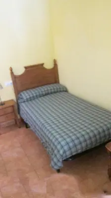 Cama o camas de una habitación en Apartaments la Fabrica