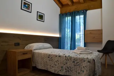 Cama o camas de una habitación en Apartamento El Mirador de la Rua