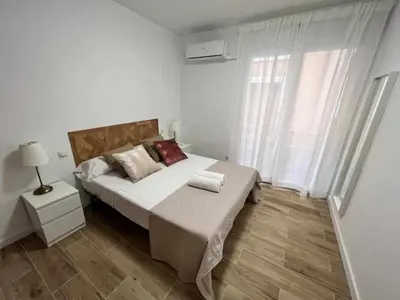 Cama o camas de una habitación en Apartamenticos Libertad I