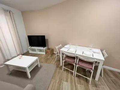 Una televisión o centro de entretenimiento en Apartamenticos Libertad I