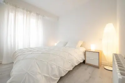 Cama o camas de una habitación en Apartamento al lado de la Romareda