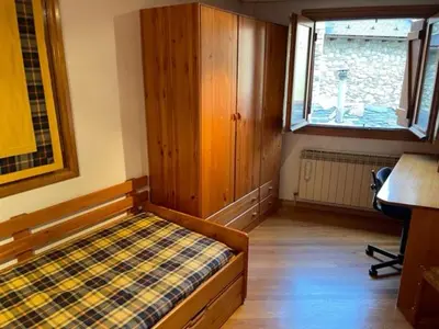 Cama o camas de una habitación en Casa Conchita de Benasque