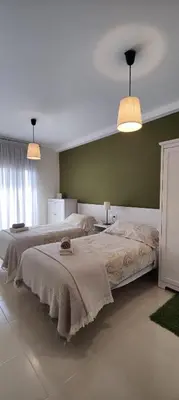 Cama o camas de una habitación en Ca l'Esmolet