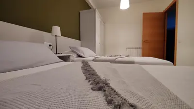 Cama o camas de una habitación en Ca l'Esmolet
