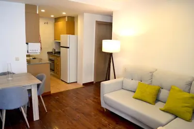 Una cocina o zona de cocina en Modern apartament de muntanya amb llar de foc by RURAL D'ÀNEU