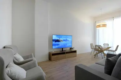 Una televisión o centro de entretenimiento en Mike House: Alójate en el corazón de Zaragoza