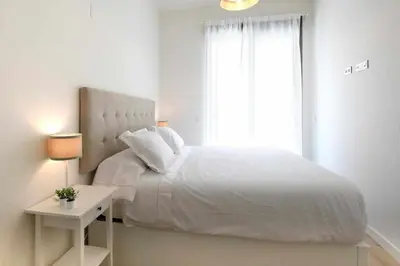 Cama o camas de una habitación en Mike House: Alójate en el corazón de Zaragoza