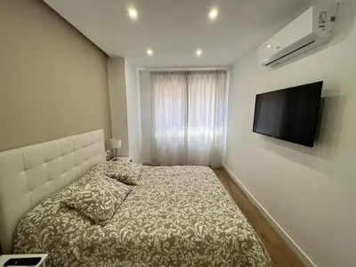 Una televisión o centro de entretenimiento en Apartamenticos Boggiero V