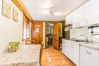Una cocina o zona de cocina en Casa El Pajar I y II