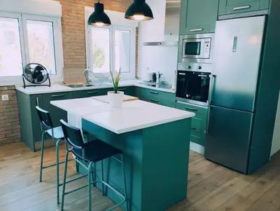 Una cocina o zona de cocina en Precioso apartamento en Pamplona junto al centro
