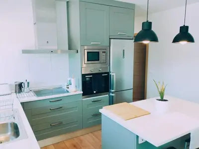 Una cocina o zona de cocina en Precioso apartamento en Pamplona junto al centro